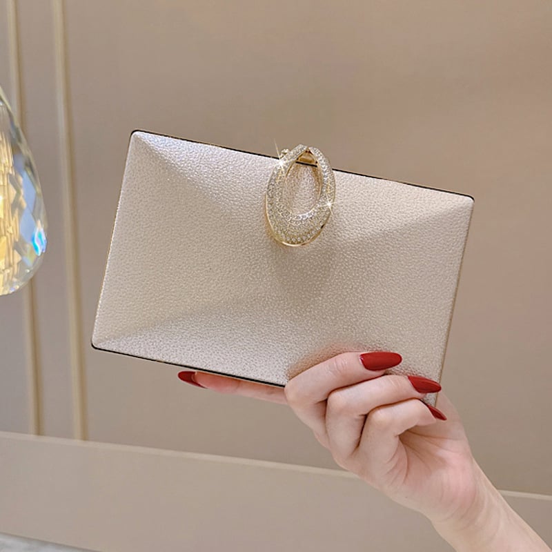 Női estélyi táska kemény héjjal és zár kristályokkal, doboz alakú, PU anyag, keresztpánt, poliészter bélés