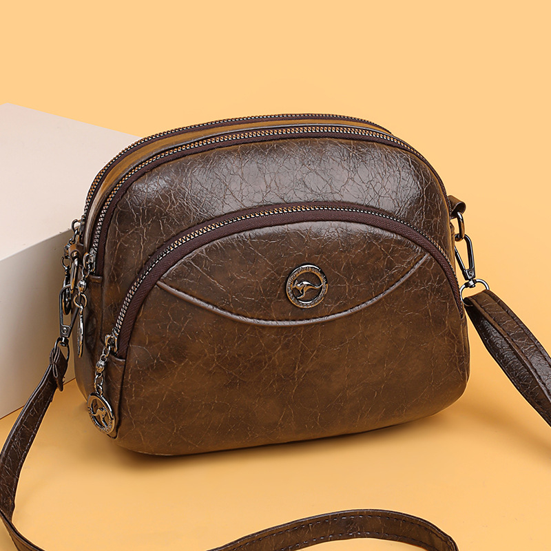 Ženska kružna crossbody torba s trostrukim dizajnom, PU materijal, podstava od poliester, zatvarač, velika kapaciteta — jesen 2025