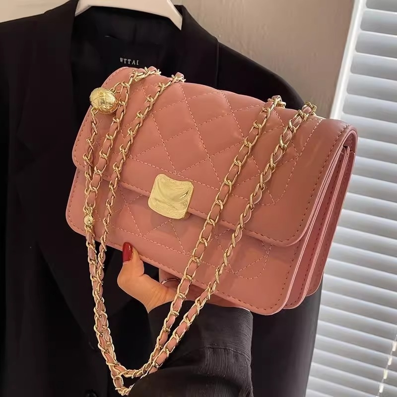 Ženska PU crossbody torbica, proljeće 2026, urbani minimalistički stil, vodoravni kvadratni oblik, zaključavanje na ključ