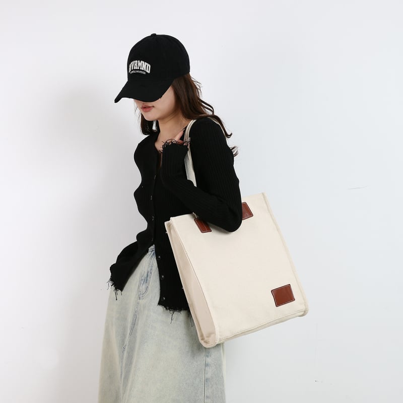 Női vászontáska váll- és tote-stílus, városi egyszerűség, függőleges négyzet alakú forma, belső zseb zipzárral