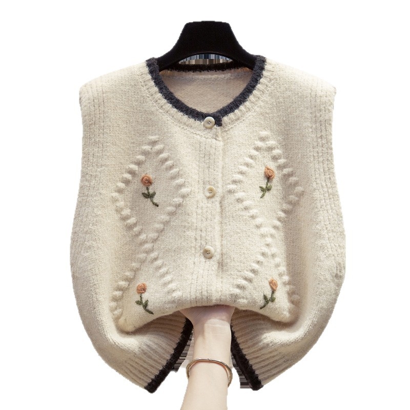 Női virágos hímzésű kardigán-vest laza szabású, kerek nyakú, egy sor gombbal, Arctic fleece anyag