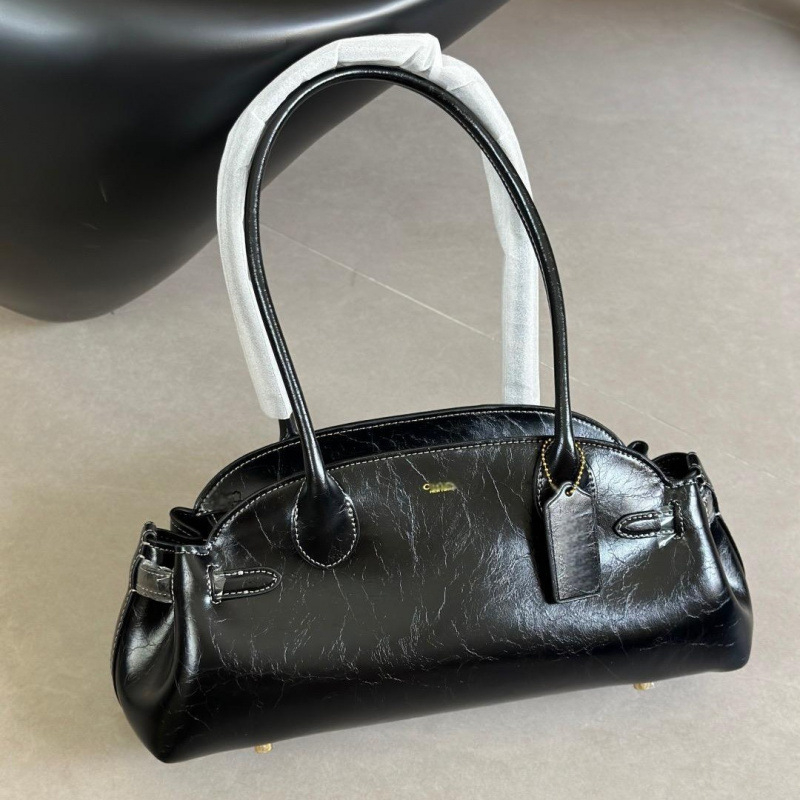 Ženska Carryall torba - gradski minimalistički stil, prava koža (prvi sloj teleće kože), zatvarač, poliesterska podstava, unutarnji džepovi