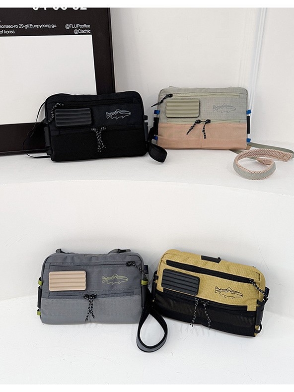 Crossbody torba za outdoor aktivnosti — Unisex, najlon, lagana, otporna, podstava od platna, urbani minimalistički stil