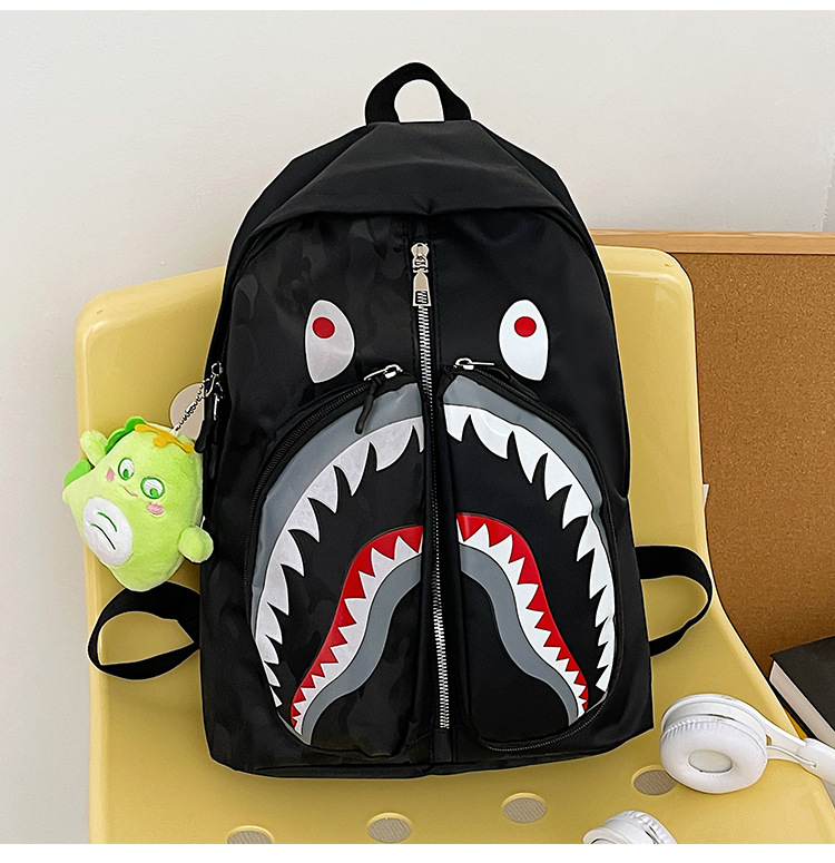 Ženski ruksak u street styleu s grafikom ajk graffita, velik kapacitet za učenike i studente (Nylon; vodootporan; zatvarač; džep za laptop; unutarnji džepovi za telefon, ID i kameru)