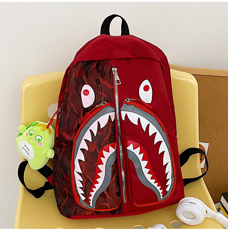 Ženski ruksak u street styleu s grafikom ajk graffita, velik kapacitet za učenike i studente (Nylon; vodootporan; zatvarač; džep za laptop; unutarnji džepovi za telefon, ID i kameru)