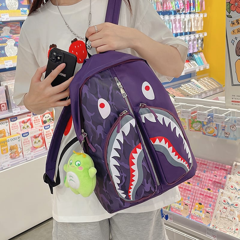 Ženski ruksak u street styleu s grafikom ajk graffita, velik kapacitet za učenike i studente (Nylon; vodootporan; zatvarač; džep za laptop; unutarnji džepovi za telefon, ID i kameru)