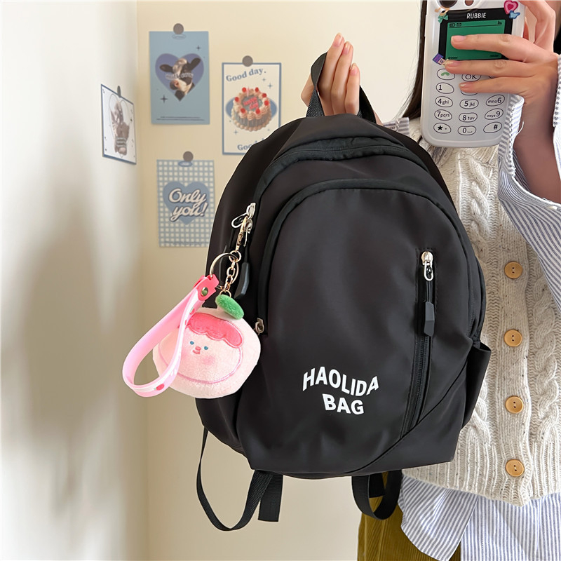 Unisex nylon ruksak za školu, prozračan, vodootporan i proširiv, zakrivljeni kaiš za rame, gradski minimalistički stil, podstava od poliestera, uzorak s slovima, Zima 2023