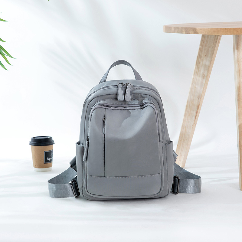 Dámsky batoh v kórejskom štýle na cestovanie, Oxford látka, objem 20-35 L, zipsové zatváranie, proti krádeži, vodeodolný