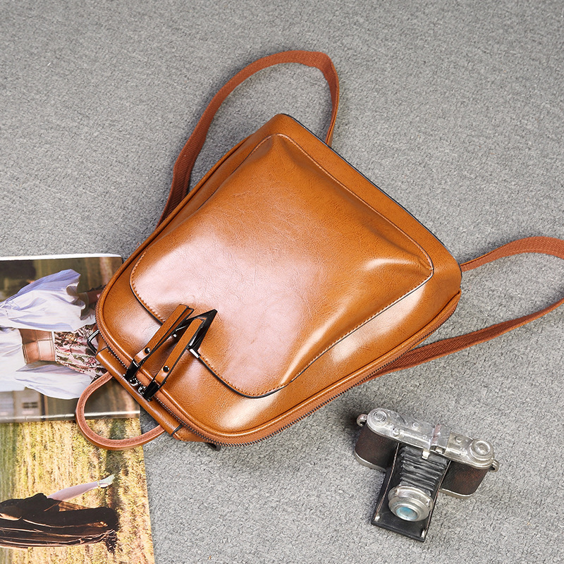 Ženski PU kožni ruksak — lagan, vodootporan, zaštita od krađe, zatvaranje na zip, unutarnji džepovi, gradski stil