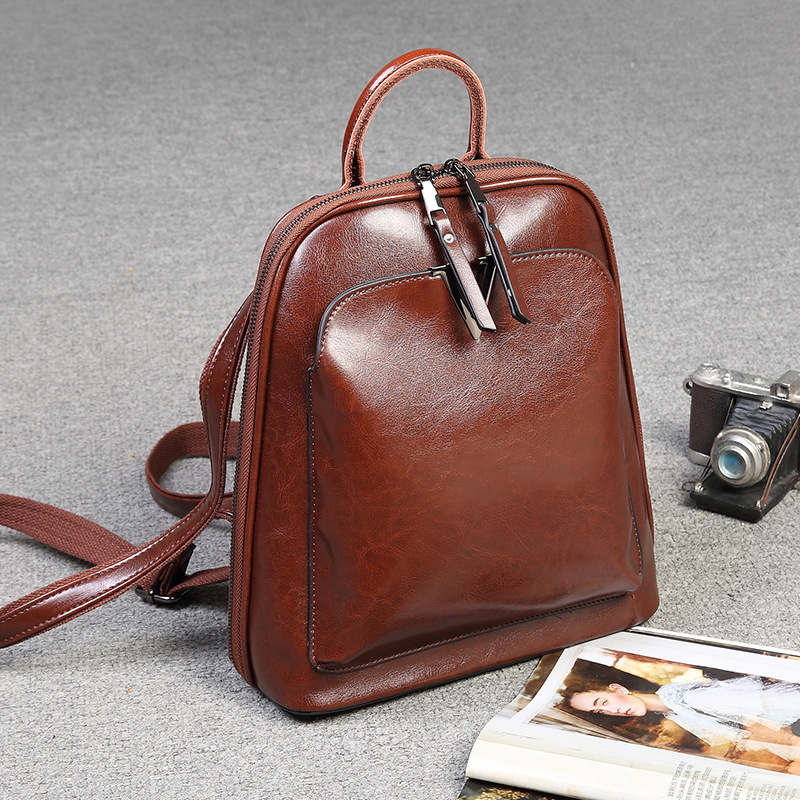 Ženski PU kožni ruksak — lagan, vodootporan, zaštita od krađe, zatvaranje na zip, unutarnji džepovi, gradski stil