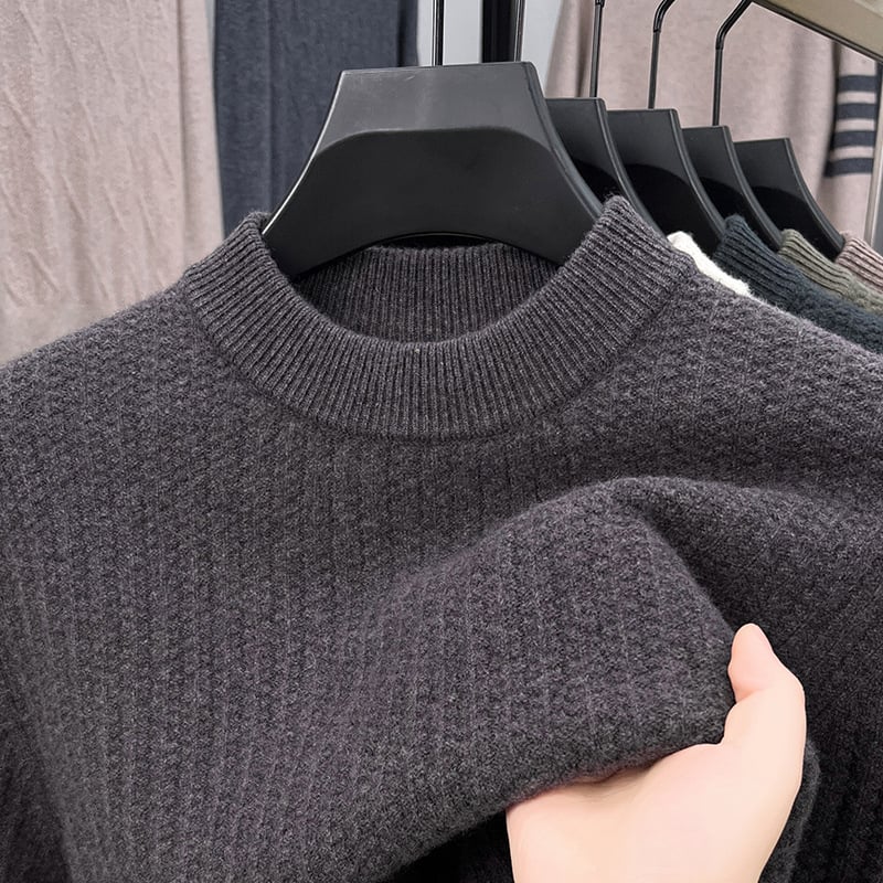 100% gyapjú pulóver, szűkített fazon, kerek nyakú, hosszú ujjú, vastag Jacquard kötés