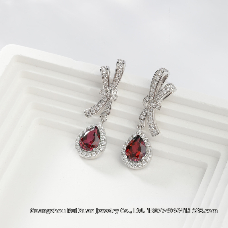 Σκουλαρίκια με σχέδιο φιόγκο, ζαφείρι εργαστηριακά καλλιεργημένο, ασήμι 925, λείανση επιφανείας