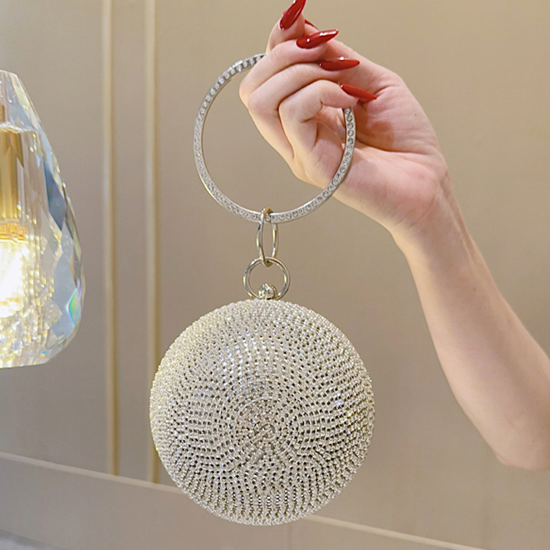 Okrugla večernja clutch s kristalima | Box bag stil, čvrsta konstrukcija, poliester podstava, otvor na vrhu