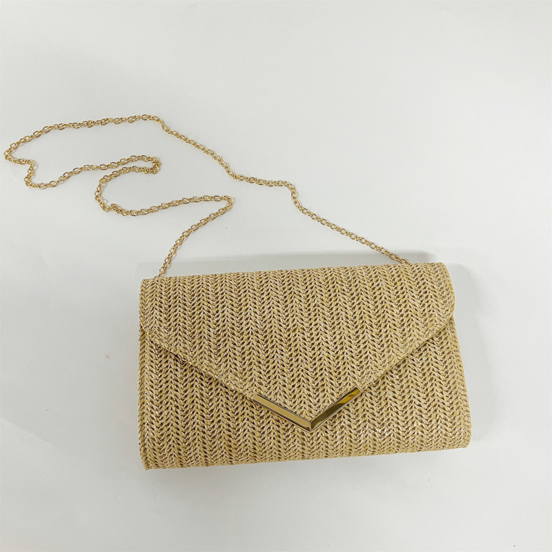 Estélyi clutch táska, textil anyagból, héj alakú, nyitás fedéllel, belső réteggel