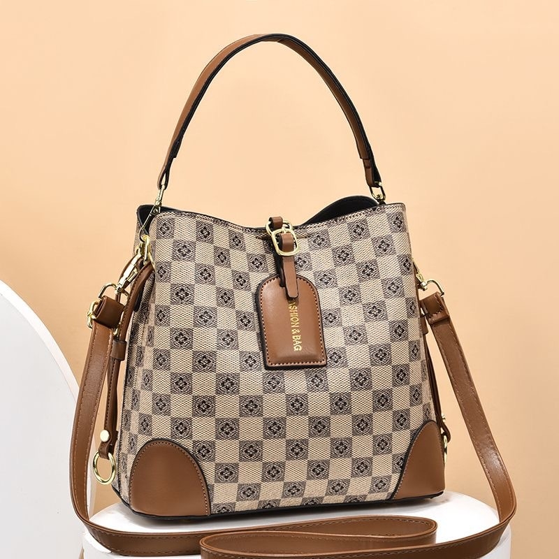 Ženska crossbody torba (urbani minimalistički stil; PU materijal; bucket bag; horizontalni kvadratni oblik; zatvarač)