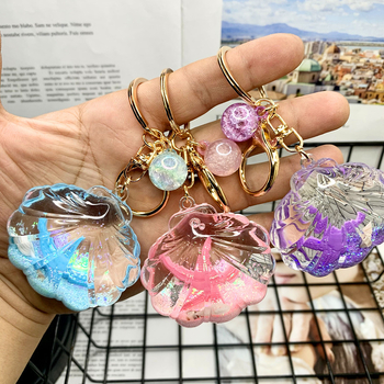 Akril kulcstartó folyékony tengeri mini tájjal – tengeri csillag egy üvegben gyorshomokkal