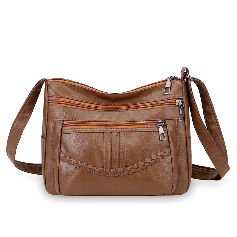 PU bőrhatású válltáska, nagy kapacitású, többszintes kialakítás, cipzáras zárás, belső zseb