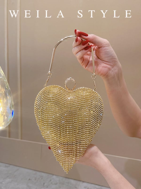 Estélyi clutch strasszköves és rojtos, szív alakú forma, záródás lakattal, poliészter bélés