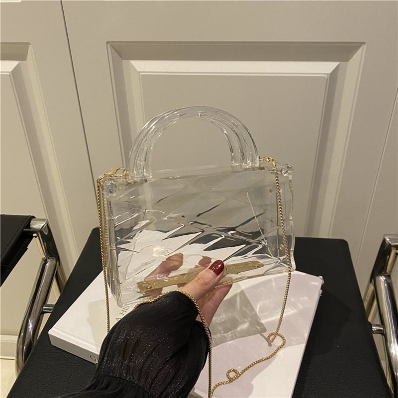 Prozirna PVC torbica za nošenje preko ramena s lancem, vodoravni kvadratni oblik, zaključavanje bravom, unutarnji pretinci za telefon i osobnu iskaznicu