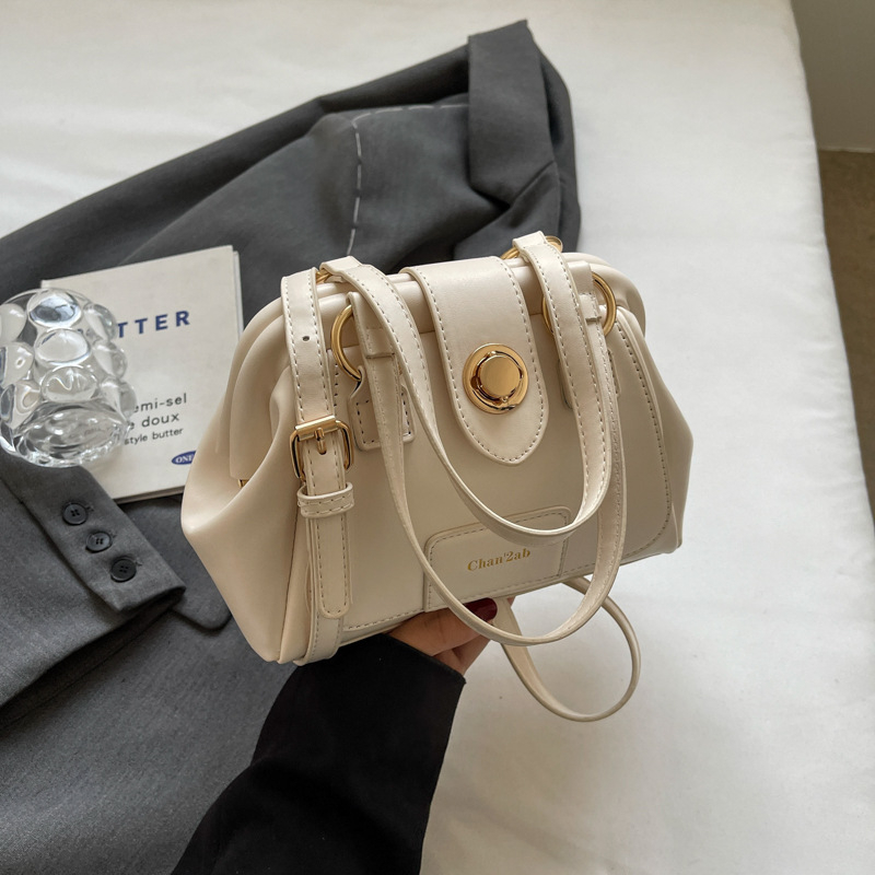 PU bucket torbica, street style, pravokutnog oblika, zatvarač s latch mehanizmom, poliester podstava, džep za telefon, jedna naramenica, za svakodnevnu upotrebu