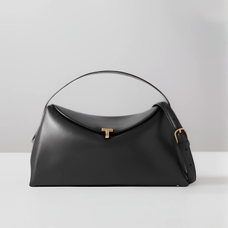 Kožna crossbody torba s poklopcem, ovalni oblik, gradski minimalistički stil, unutarnja torbica za mobitel, podstava od superfiber velura, zaključavanje, dva kaiša