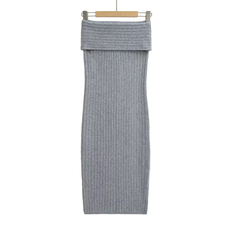 Duga pamukna suknja koja prianja uz bokove, stil ulične mode, jednobojni uzorak, sadržaj pamuka 30–50%.