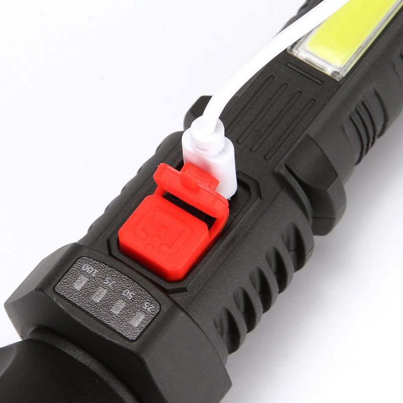 LED baterijska svjetiljka za vanjsku upotrebu, USB punjenje, ručno pokretanje, ABS kućište, dvostruka namjena (radno i traženje), domet 100–200 m