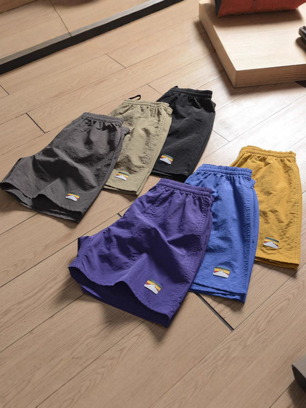 Muške sportske šorceve od 100% poliestera, duljine 7 inča, mikro-elastični, straight kroj