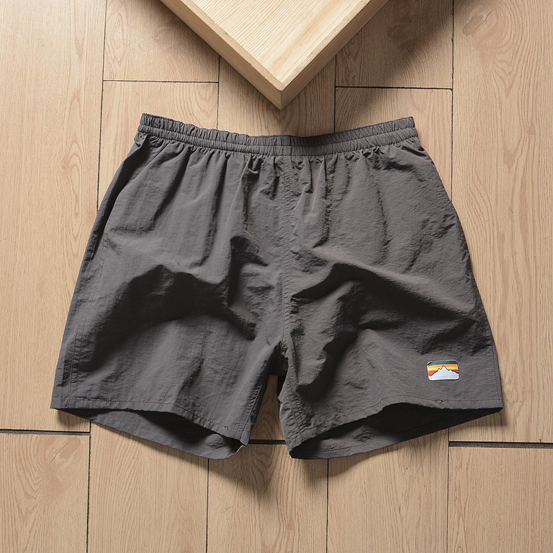 Muške sportske šorceve od 100% poliestera, duljine 7 inča, mikro-elastični, straight kroj