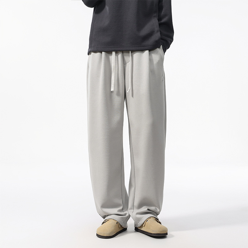 Férfiak számára lazán illeszkedő sportos nadrág, magas derékkal, hosszú, poliészter-pamut-elasztán keverék, lélegző és nedvességelvezető