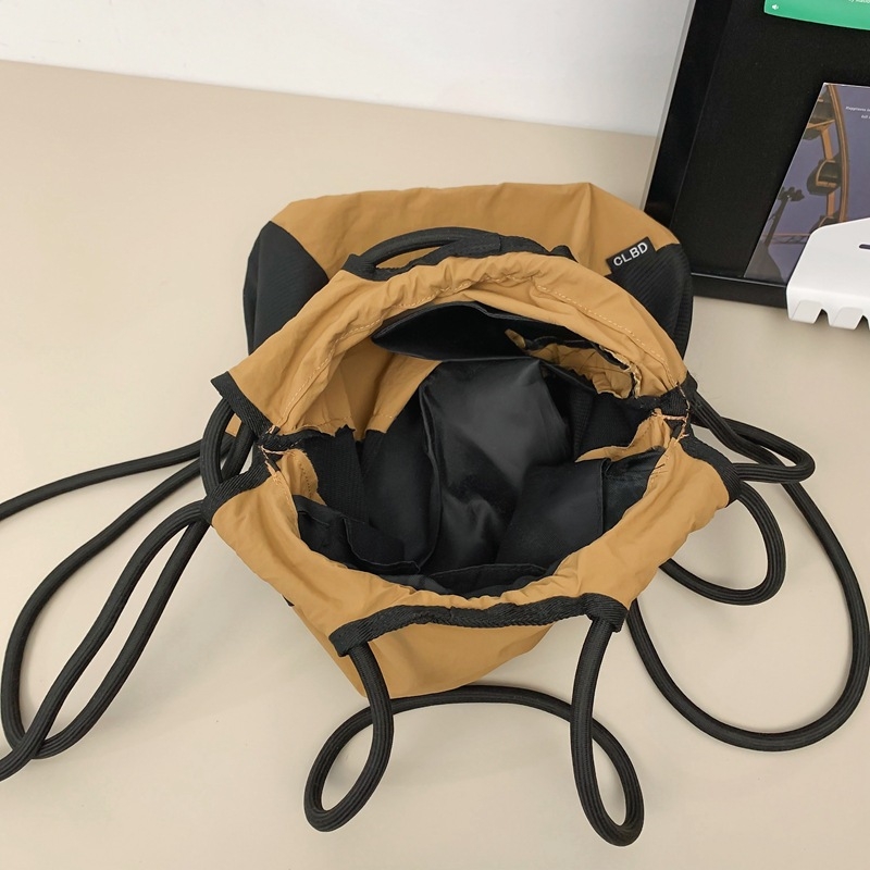 Unisex nylon ruksak – laganog stila s vezanjem, višenamjenski za svakodnevicu, putovanja i fitness; zakrivljene naramenice, proljeće 2024