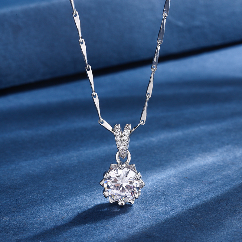 Ορείχαλκος σετ κοσμημάτων τριών τεμαχίων (σκουλαρίκια, κολιέ και βραχιόλι) με ενθέσεις ζιρκόν, αλυσίδα τύπου melon seed και μενταγιόν από χαλκό.