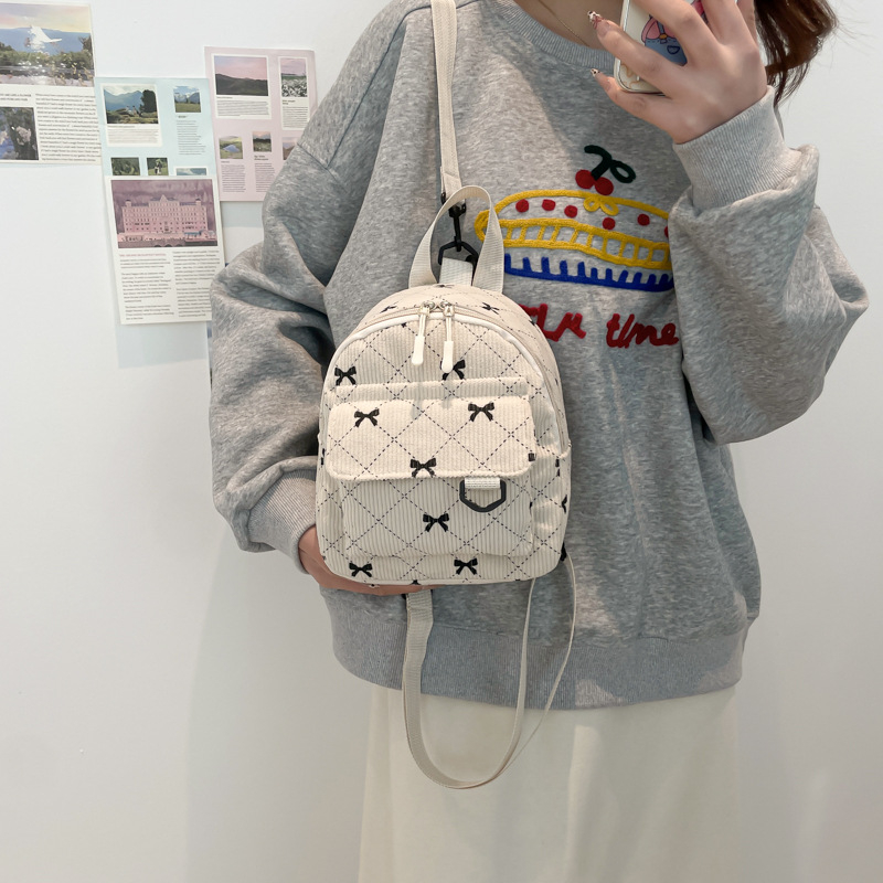 Rucsac cu fundă în stil coreean, design urban minimalist; material nylon; capacitate sub 20L; compatibil cu laptop de 8 inch; primăvara 2025