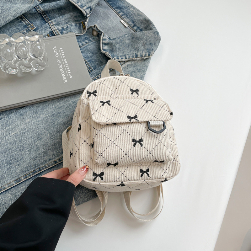 Rucsac cu fundă în stil coreean, design urban minimalist; material nylon; capacitate sub 20L; compatibil cu laptop de 8 inch; primăvara 2025