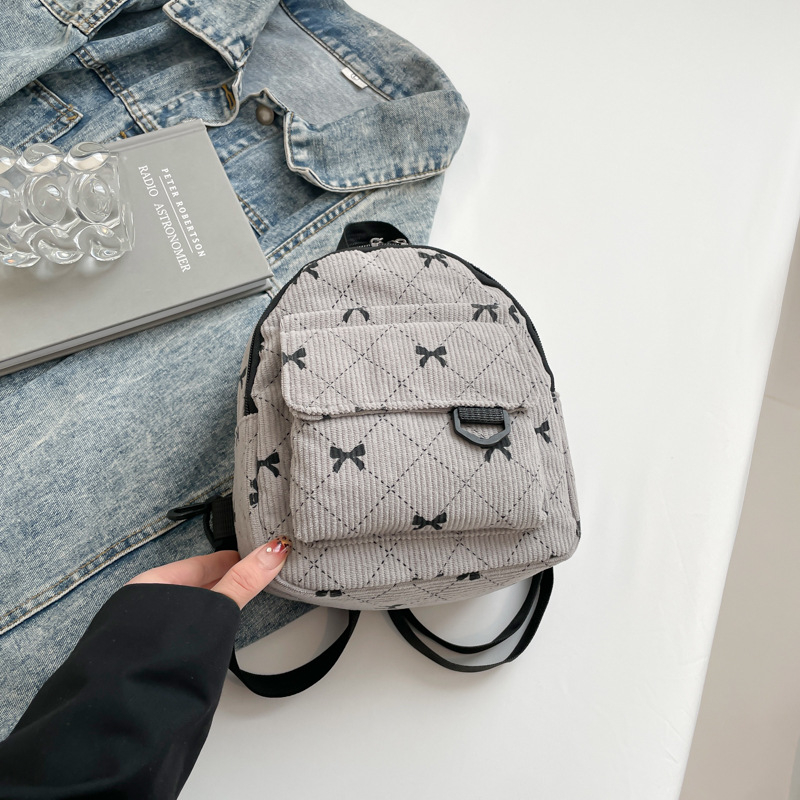Rucsac cu fundă în stil coreean, design urban minimalist; material nylon; capacitate sub 20L; compatibil cu laptop de 8 inch; primăvara 2025
