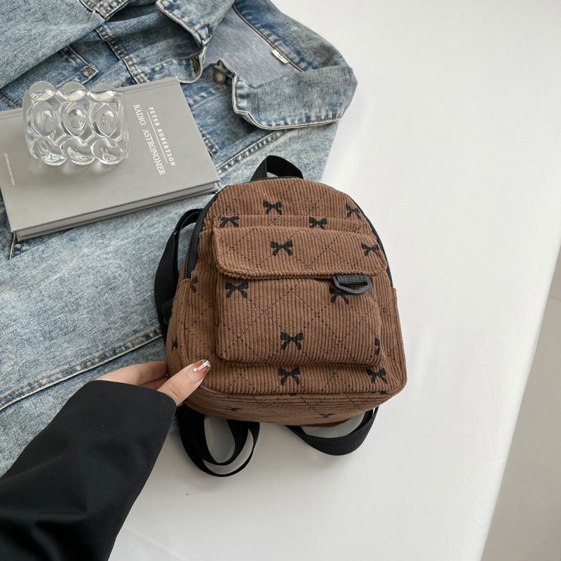 Rucsac cu fundă în stil coreean, design urban minimalist; material nylon; capacitate sub 20L; compatibil cu laptop de 8 inch; primăvara 2025