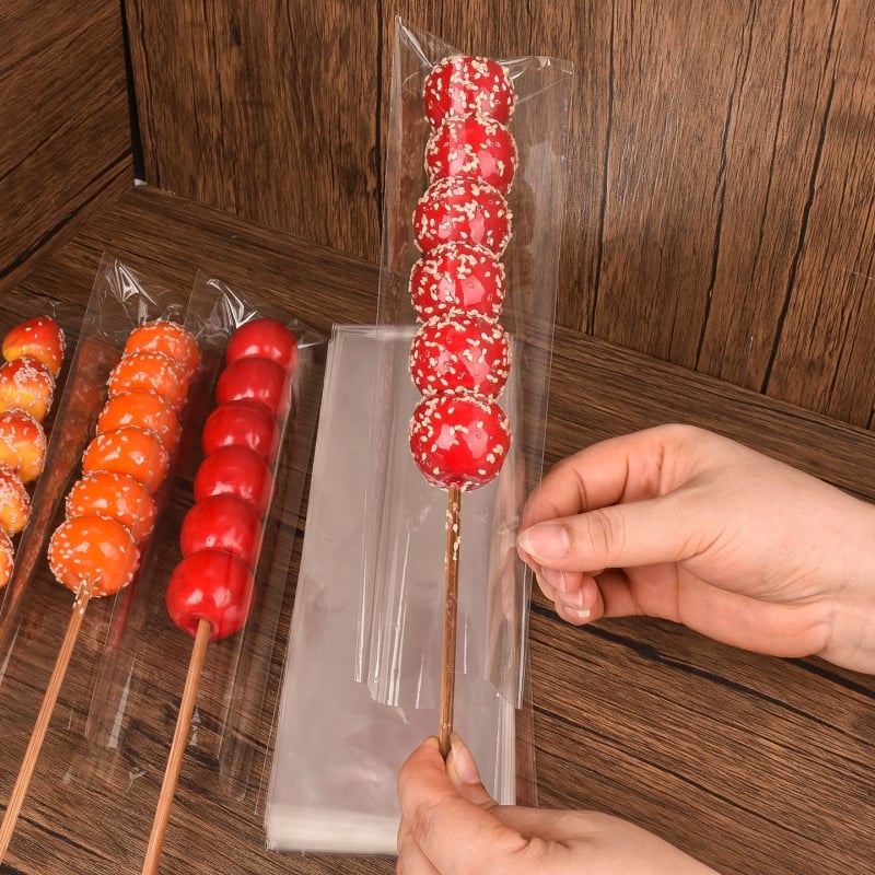 Pungi transparente pentru ambalarea bețișoarelor cu fructe caramelizate — ambalare manuală, personalizare disponibilă, brand Paper love, licență de producție Zhejiangxk16-204-00047