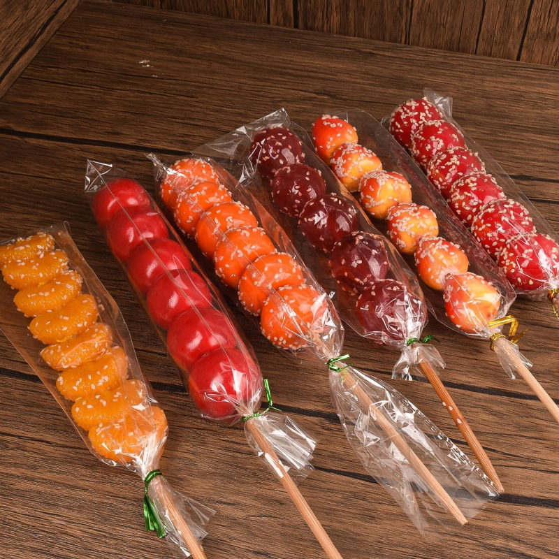 Pungi transparente pentru ambalarea bețișoarelor cu fructe caramelizate — ambalare manuală, personalizare disponibilă, brand Paper love, licență de producție Zhejiangxk16-204-00047