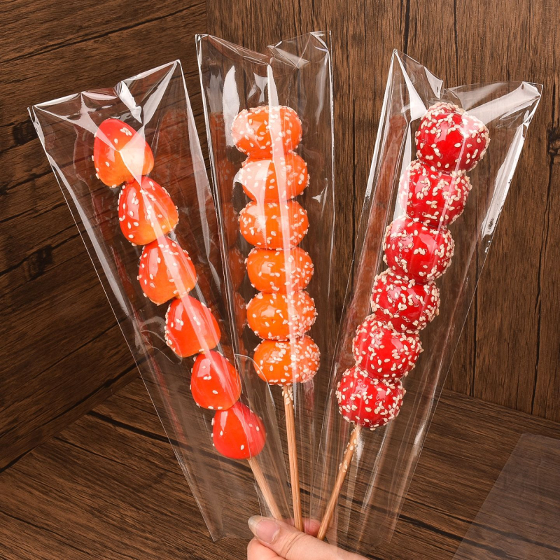 Pungi transparente pentru ambalarea bețișoarelor cu fructe caramelizate — ambalare manuală, personalizare disponibilă, brand Paper love, licență de producție Zhejiangxk16-204-00047