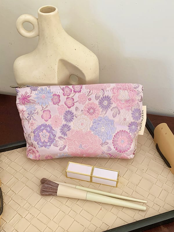 Sminktáska virágmintával (Poliészter; bélés: vászon; tárolható; 2025 tavasza)