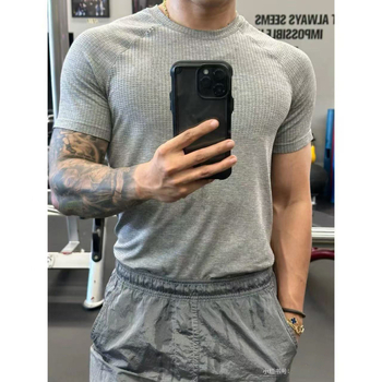 Unisex bezšivna jacquard majica za trening, brzo sušeća, jednobojni uzorak s točkicama, ljeto
