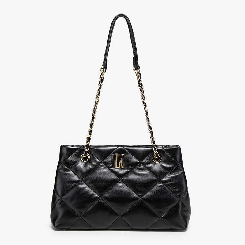 Crossbody torba, kviliran dizajn, dvostruke naramenice (materijal: PU; podstava: poliester; zatvaranje: zip; unutarnja džep s zipom; oblik: vodoravni kvadrat)