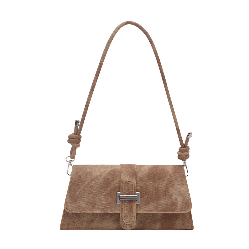 Ženska crossbody torba ispod pazuha, pravokutnog oblika, gradski minimalistički stil, poseban materijal, zatvaranje kapom