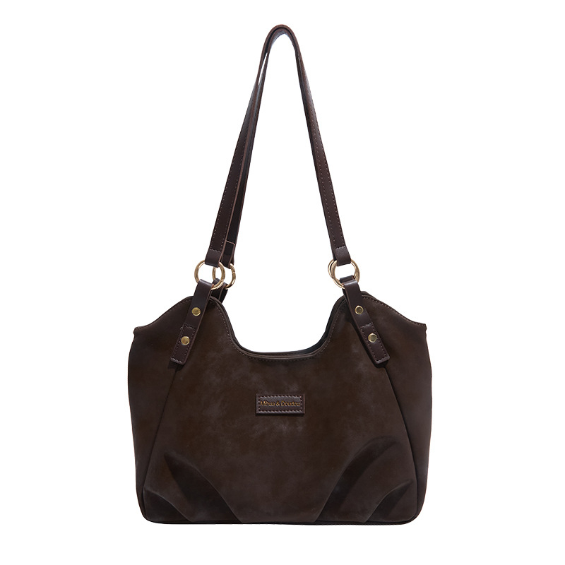 Semiš tote torba s zatvaračem na zip, laminirana unutarnja džep na zip, horizontalni kvadratni oblik, jedna naramenica.