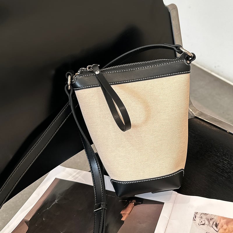 Ženska PU bucket torba, gradski minimalistički stil, proljeće 2025, svakodnevna torba za rame ili crossbody.
