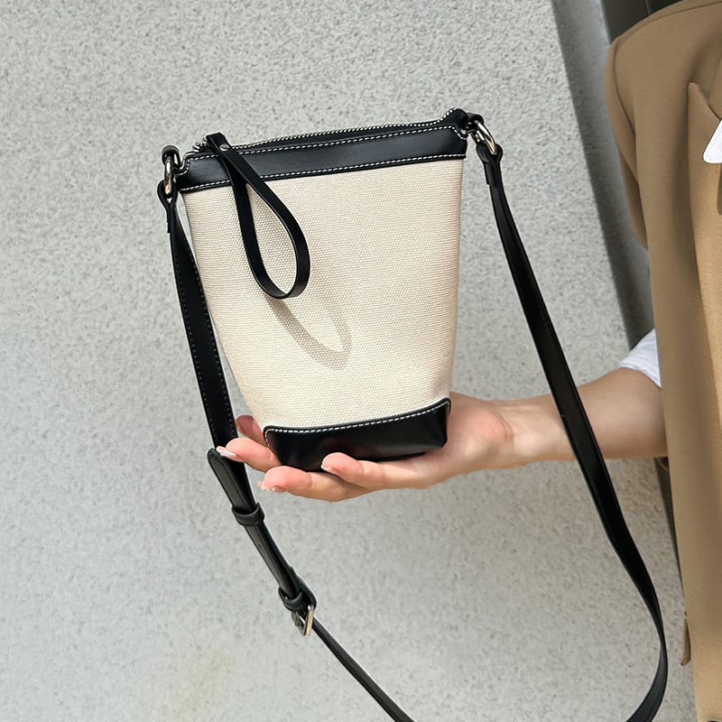 Ženska PU bucket torba, gradski minimalistički stil, proljeće 2025, svakodnevna torba za rame ili crossbody.