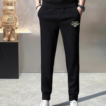 Férfi melegítőnadrág fleece-béléssel és rhinestone díszítéssel, karcsú szabás, középmagas derekú, 65% pamut