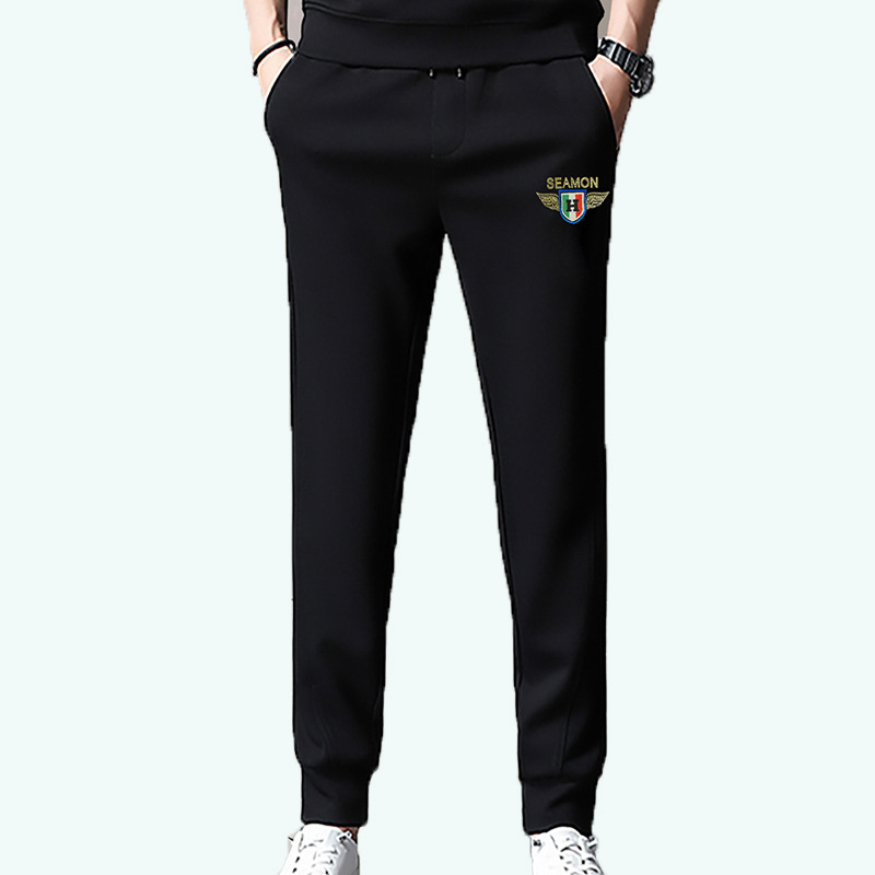 Férfi melegítőnadrág fleece-béléssel és rhinestone díszítéssel, karcsú szabás, középmagas derekú, 65% pamut