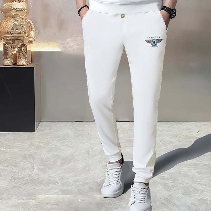 Férfi melegítőnadrág fleece-béléssel és rhinestone díszítéssel, karcsú szabás, középmagas derekú, 65% pamut