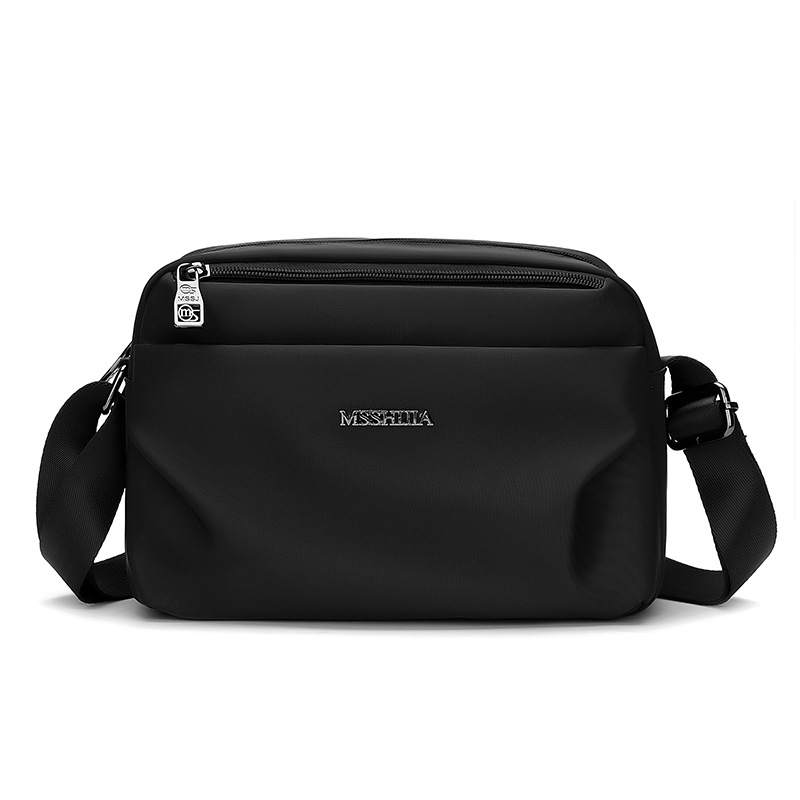 Ženska crossbody torba, tekstilni materijal, urban minimalistički stil, horizontalni kvadratni oblik, zatvarač, džep za telefon